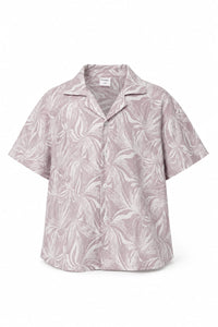 A short-sleeve button-up camp shirt with a light pink and white tropical leaf pattern, displayed on a clean white background.