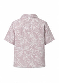 A short-sleeve button-up shirt shown from the back, featuring a light pink and white tropical floral pattern.